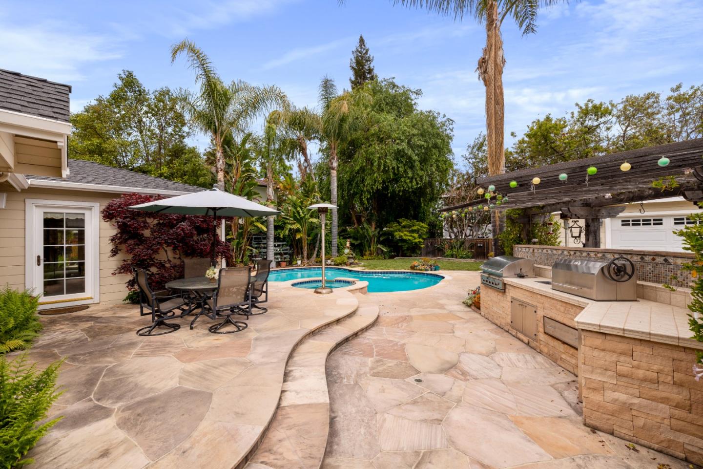 261 Cherry Lane Campbell, CA 95008 - Photo 30 of 49 a view of a house with sitting area and garden with furniture