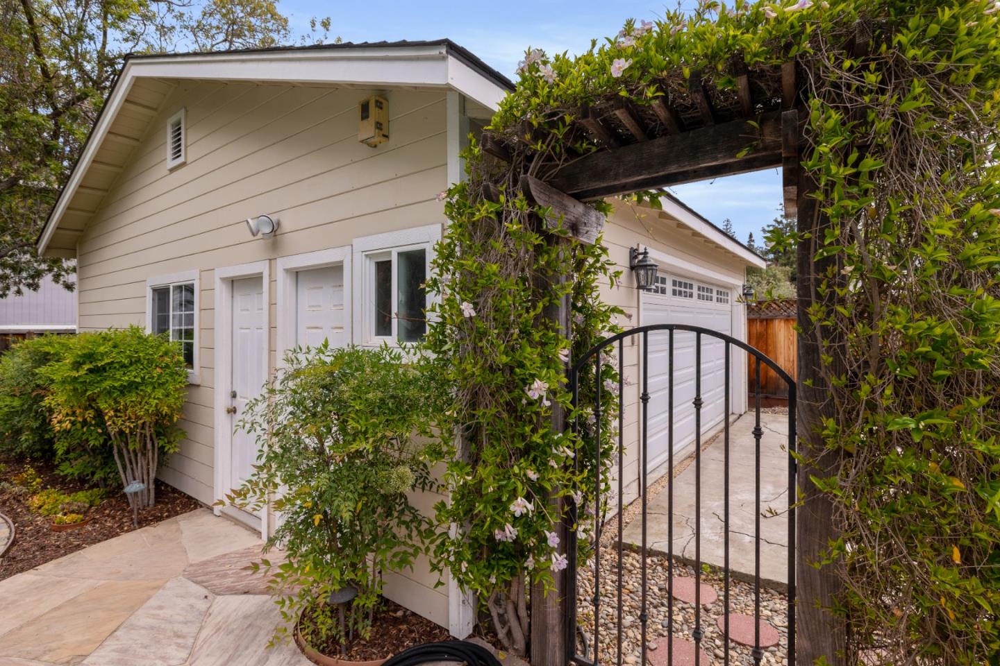 261 Cherry Lane Campbell, CA 95008 - Photo 36 of 49 a front view of a house with plants