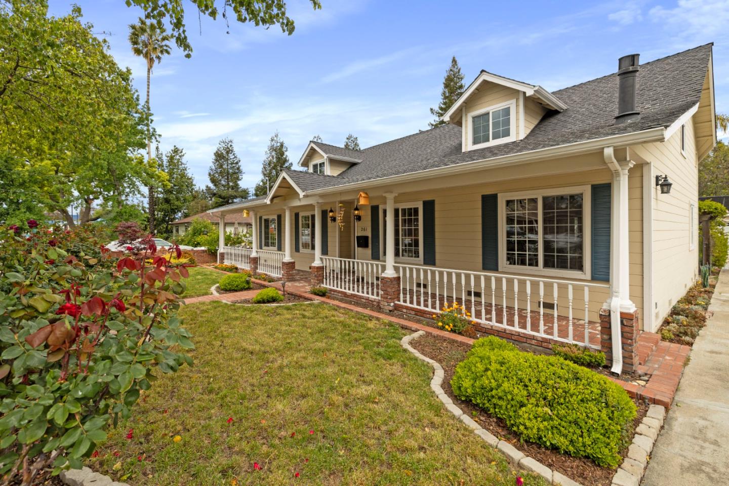 261 Cherry Lane Campbell, CA 95008 - Photo 47 of 49 a view of a house with a small yard and wooden fence