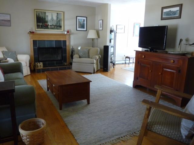 6 Farm Path Road Edgartown, MA 02539 - Photo 8 of 14 a living room with furniture and a flat screen tv