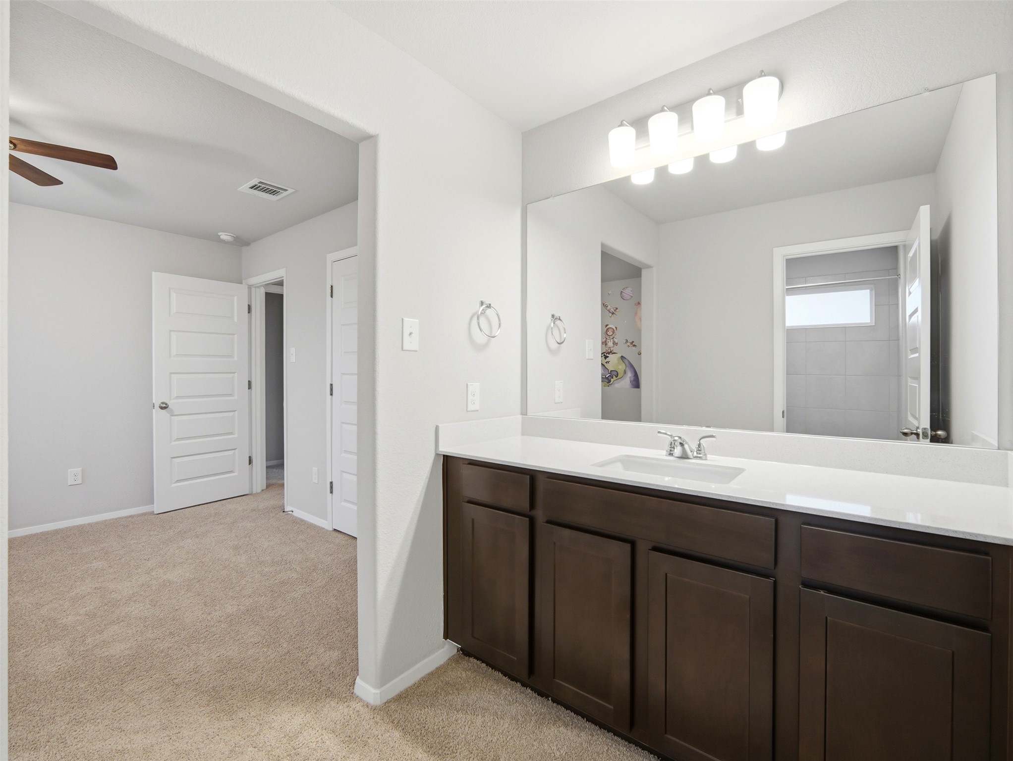 60 Bent Trl Lane Georgetown, TX 78628 - Photo 31 of 40 A well-appointed vanity with generous counter space awaits in this comfortable room.