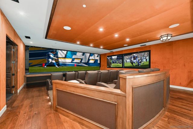 a living room with furniture a dining table and kitchen view