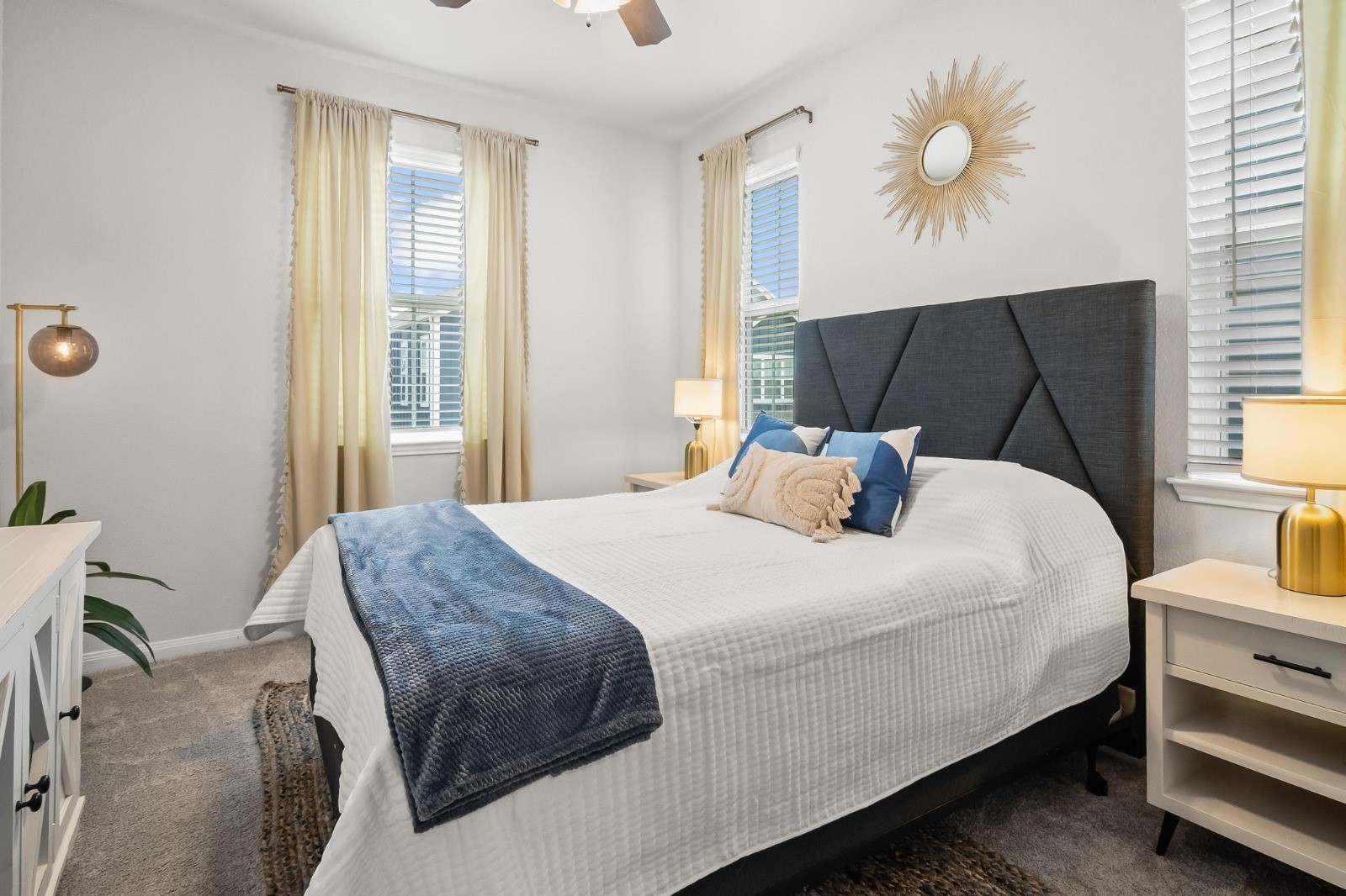 5511 Cuerta Street Houston, TX 77023 - Photo 11 of 25 a bedroom with a bed and wooden floor