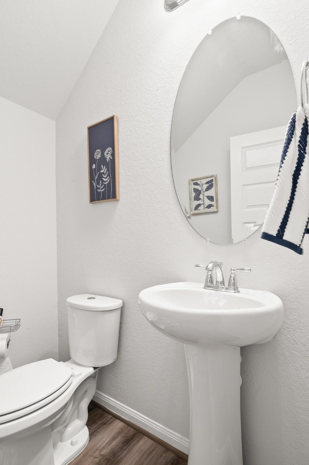 5511 Cuerta Street Houston, TX 77023 - Photo 20 of 25 a bathroom with a toilet sink and mirror