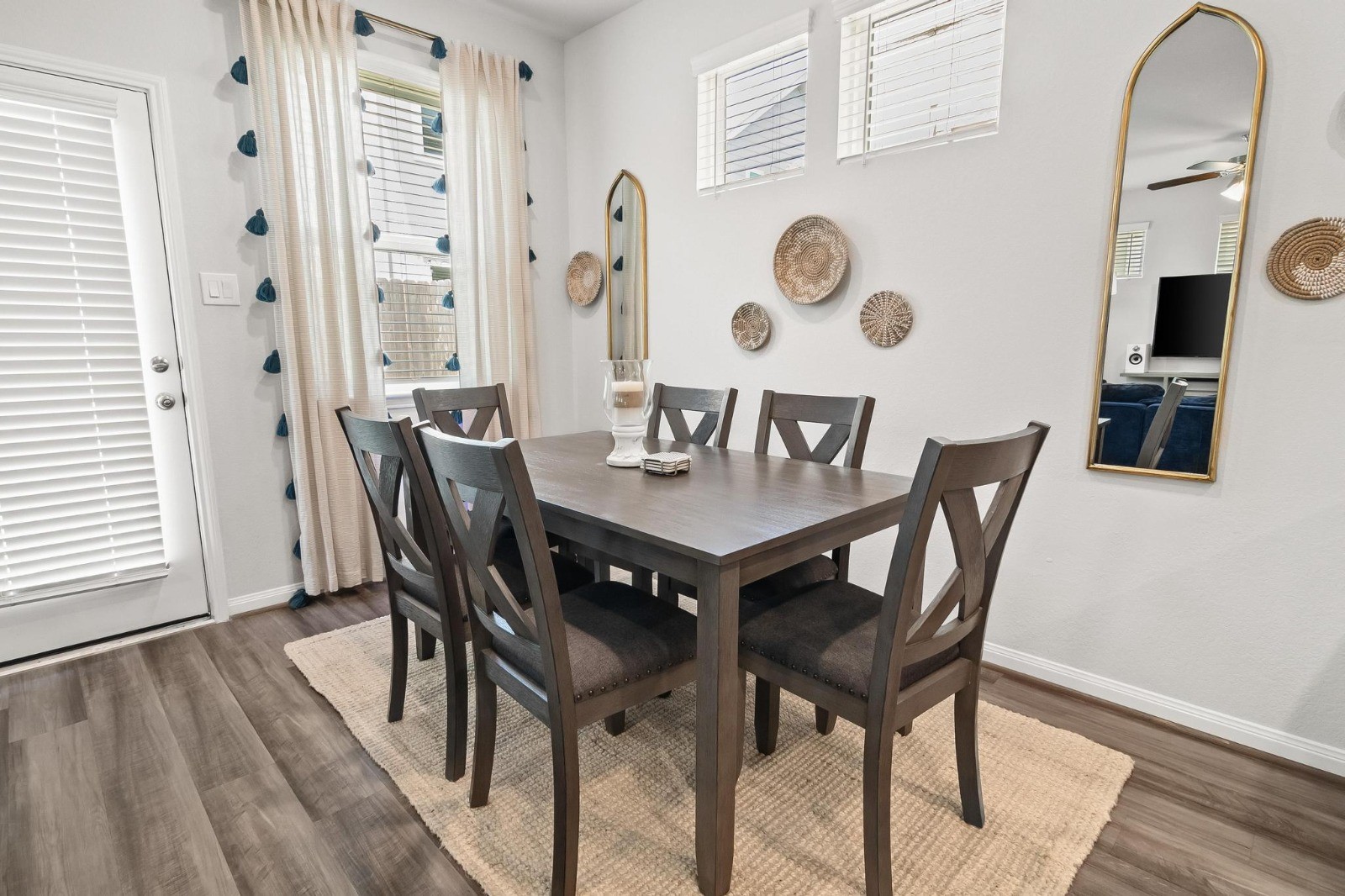5511 Cuerta Street Houston, TX 77023 - Photo 6 of 25 a view of a dining room with furniture and wooden floor