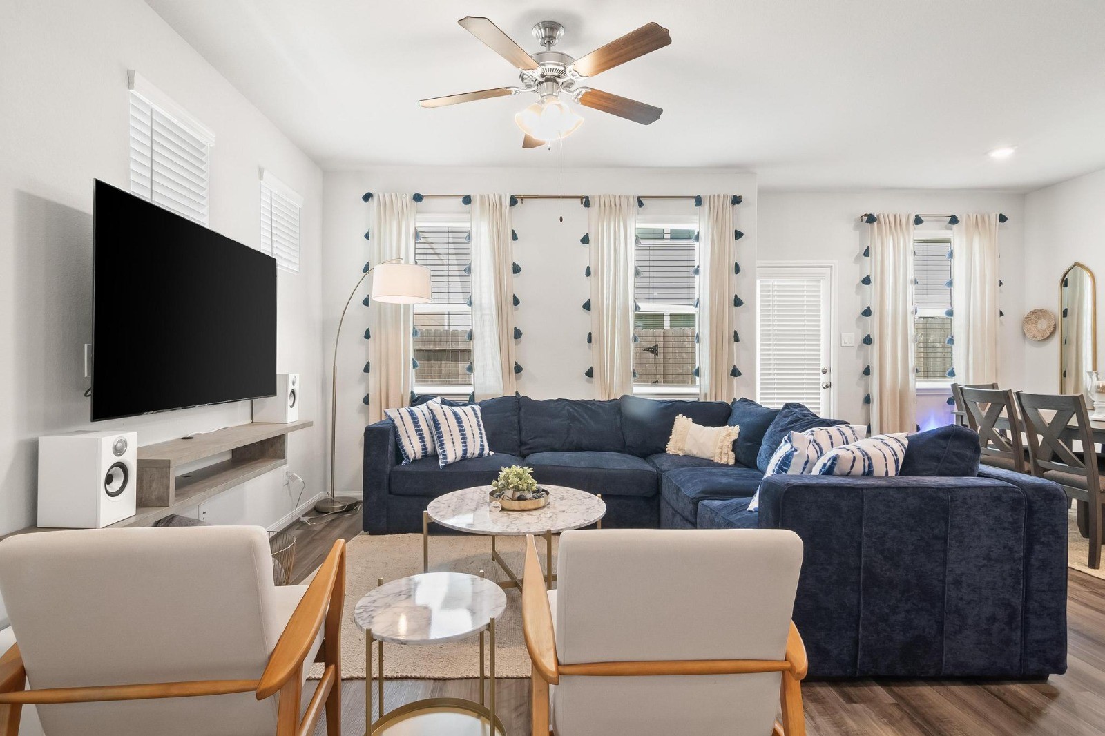 5511 Cuerta Street Houston, TX 77023 - Photo 7 of 25 a living room with furniture and a flat screen tv