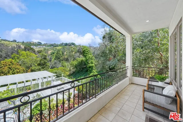 a view of a two chair in the balcony