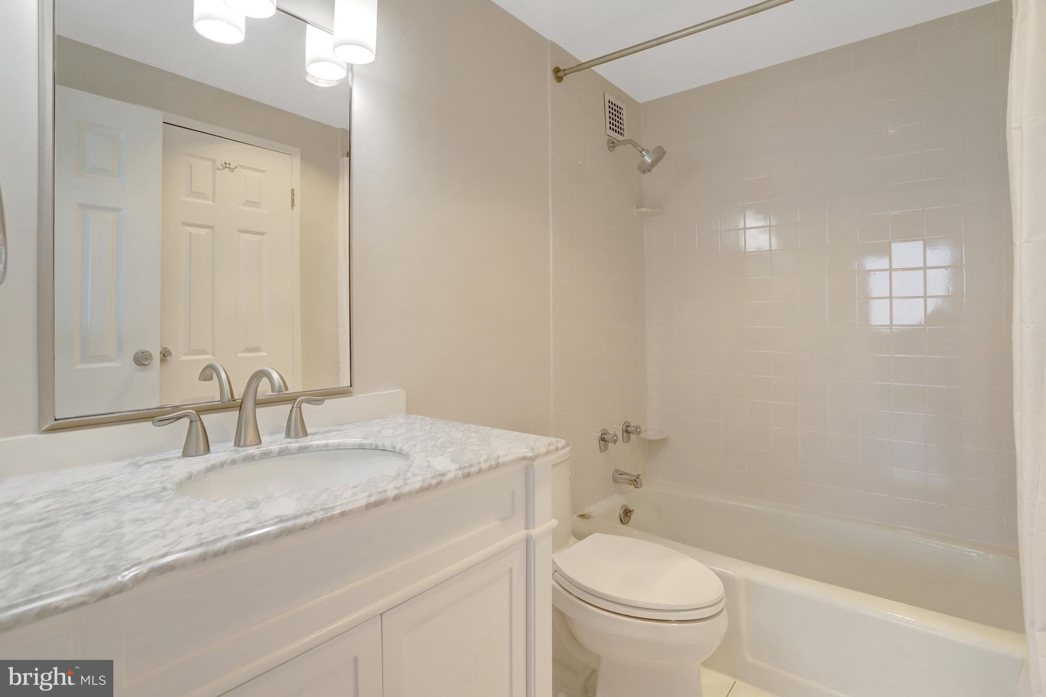 4141 North Henderson Road, Unit 606 Arlington, VA 22203 - Photo 25 of 39 Bathroom 1
