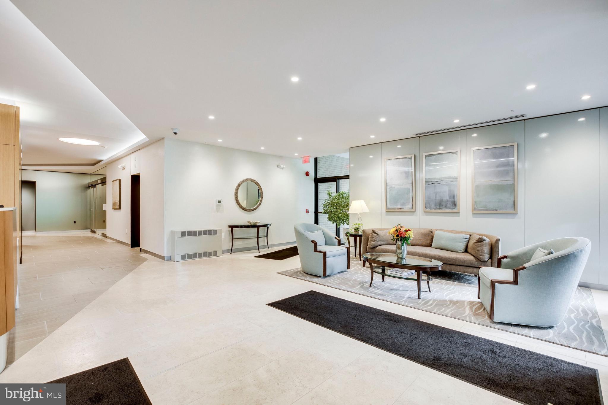 4141 North Henderson Road, Unit 606 Arlington, VA 22203 - Photo 33 of 39 Appealing Light Filled Lobby