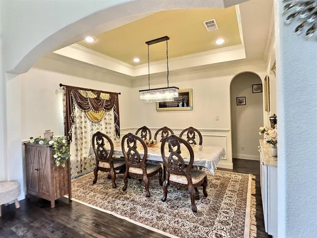 a view of a dining room with furniture