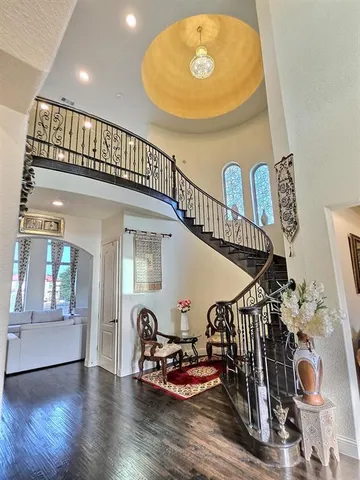 a view of a balcony with furniture