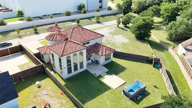 aerial view of a house with swimming pool