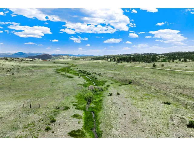 a view of an outdoor space and mountain view