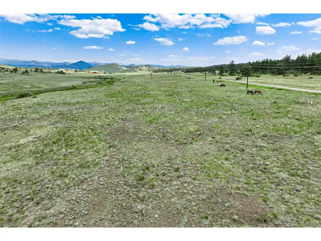 a view of an outdoor space and mountain view