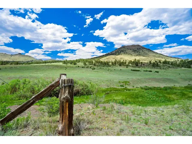 a view of a lake with a big yard