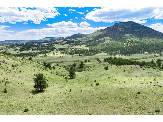 a view of a lake with mountains in the background