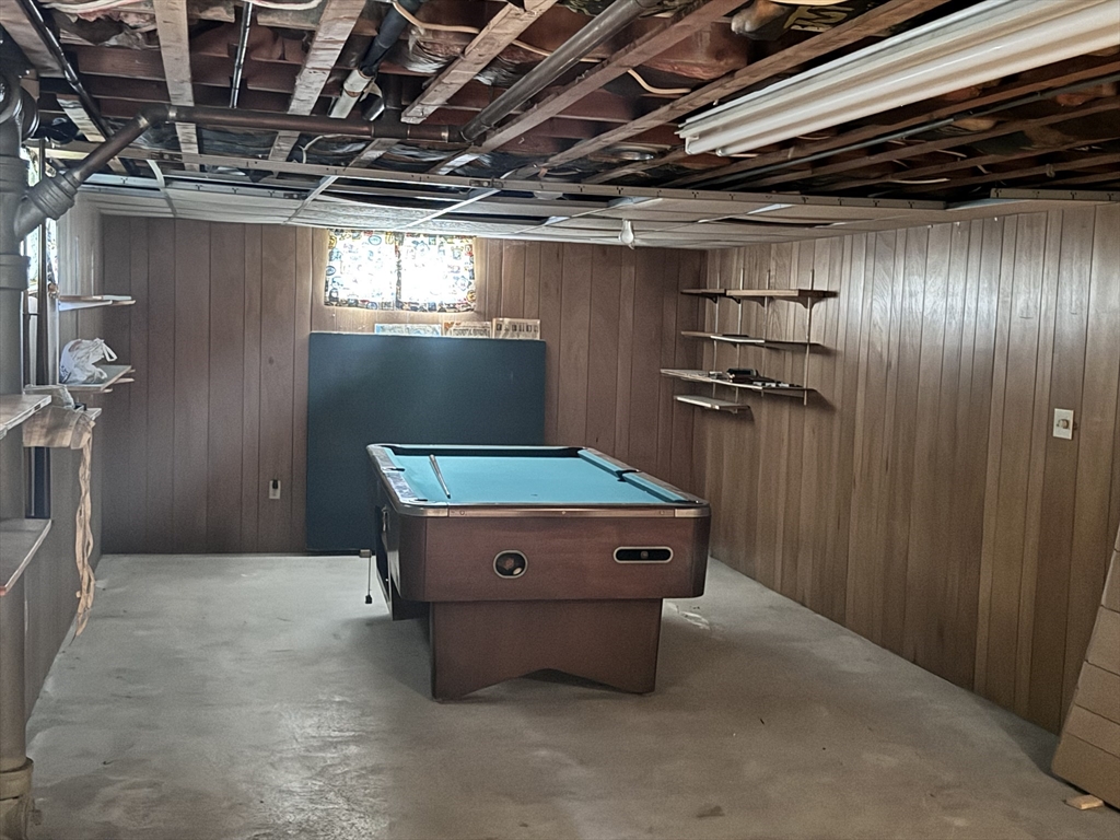 77 Grattan Street Fall River, MA 02721 - Photo 18 of 20 a room with wooden walls