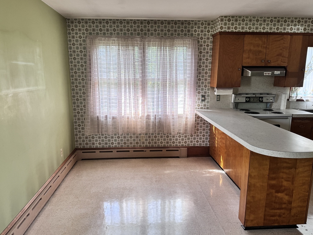 77 Grattan Street Fall River, MA 02721 - Photo 10 of 20 a view of a kitchen with a sink