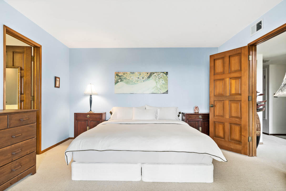 34 Rubio Road Santa Barbara, CA 93103 - Photo 9 of 10 a bedroom with a large bed and a window