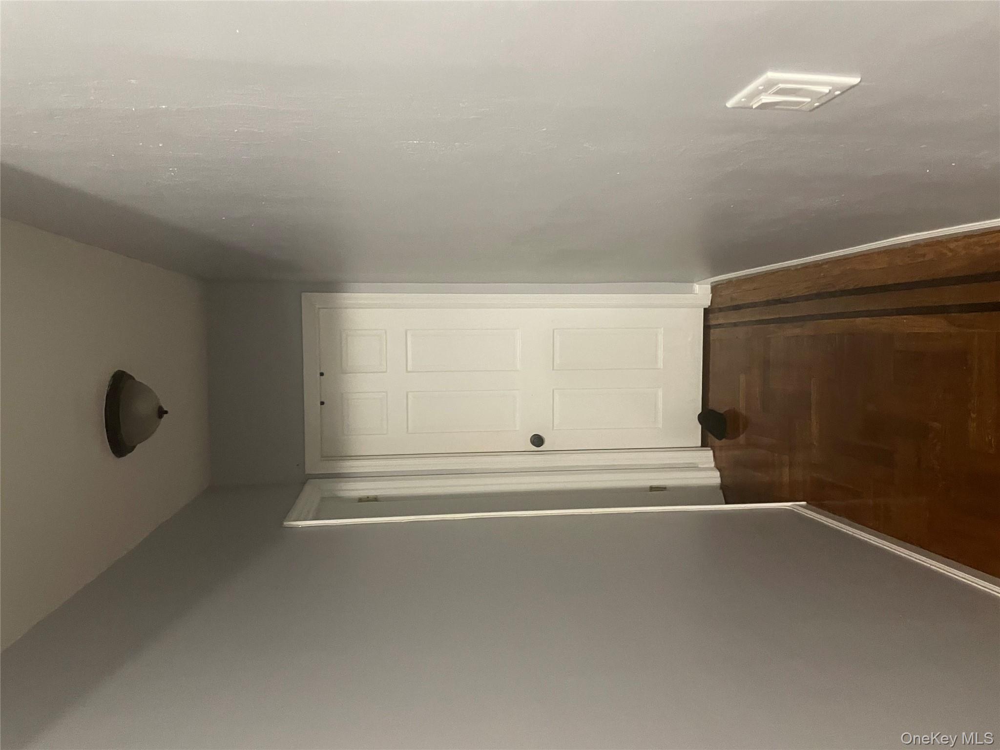 3418 Irwin Avenue Bronx, NY 10463 - Photo 1 of 19 a view of hallway with wooden floor