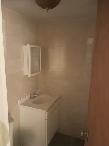 a room with furniture and wooden floor