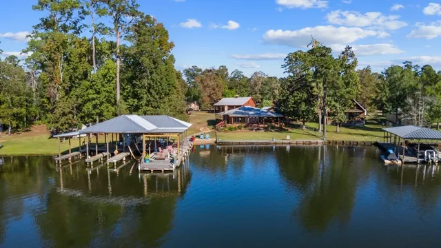 a view of a lake with outdoor seating