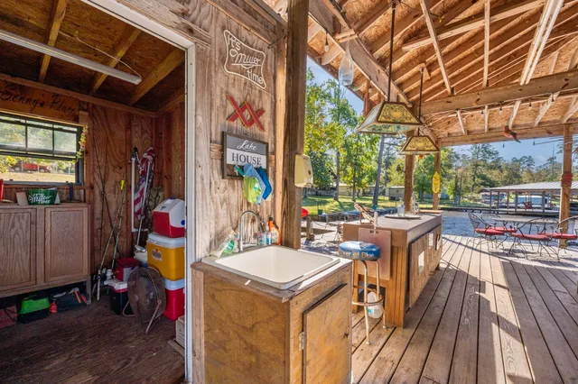 a view of a chairs and tables in the balcony