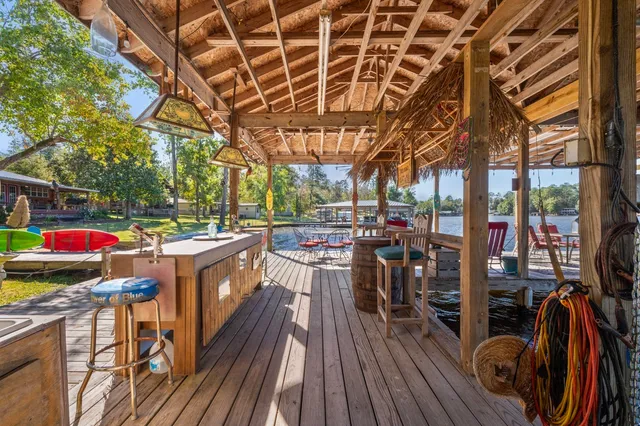 a view of a lake with a house in the background