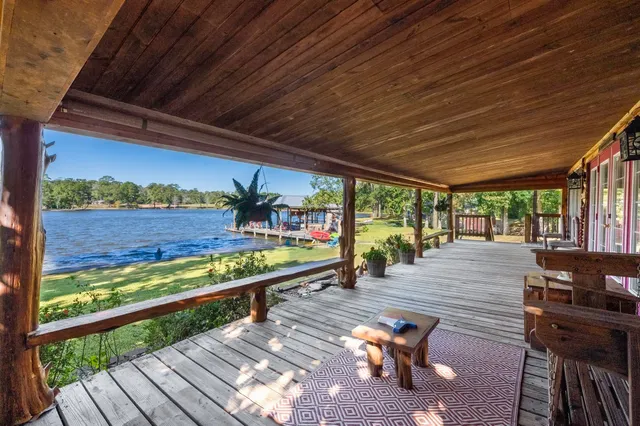 a view of a patio with wooden floor