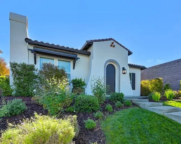 a house view with a outdoor space