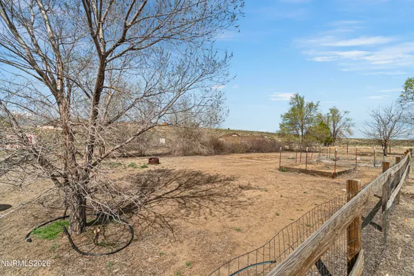 a view of a swimming pool with a yard