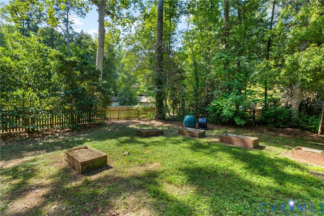 13611 Winterberry Ridge Midlothian, VA 23112 - Photo 29 of 30 Expansive backyard featuring a manicured lawn, est