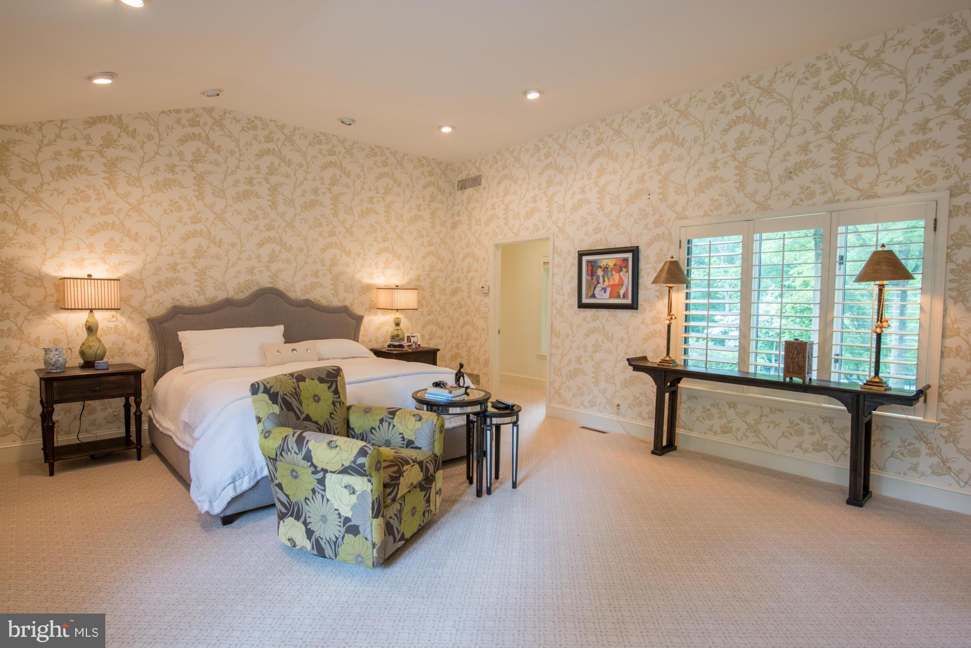 2513 Merrymans Mill Road Phoenix, MD 21131 - Photo 14 of 27 a bed sitting in a spacious bedroom next to a window