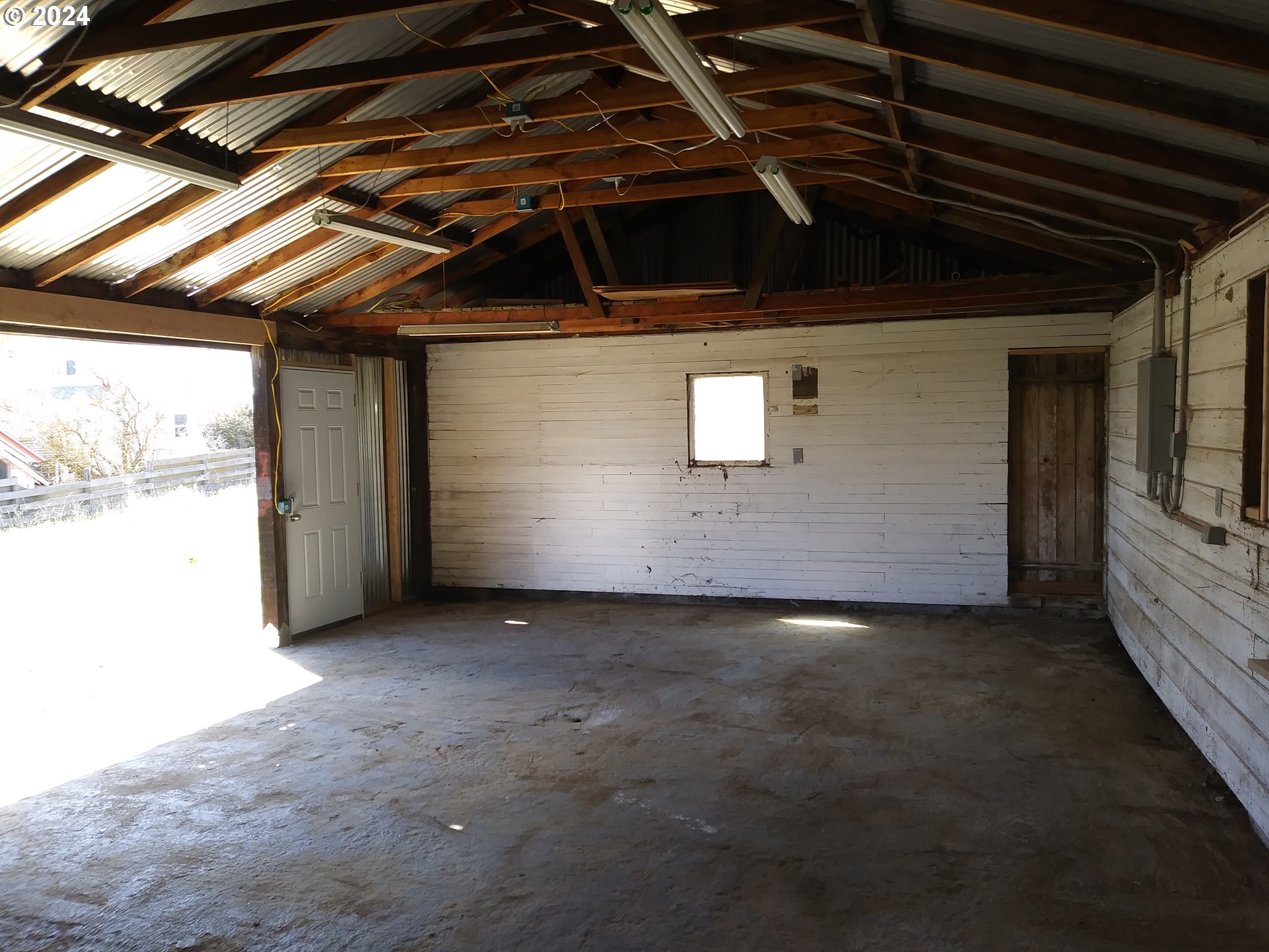 301 2nd Street Moro, OR 97039 - Photo 2 of 8 a view of a car garage