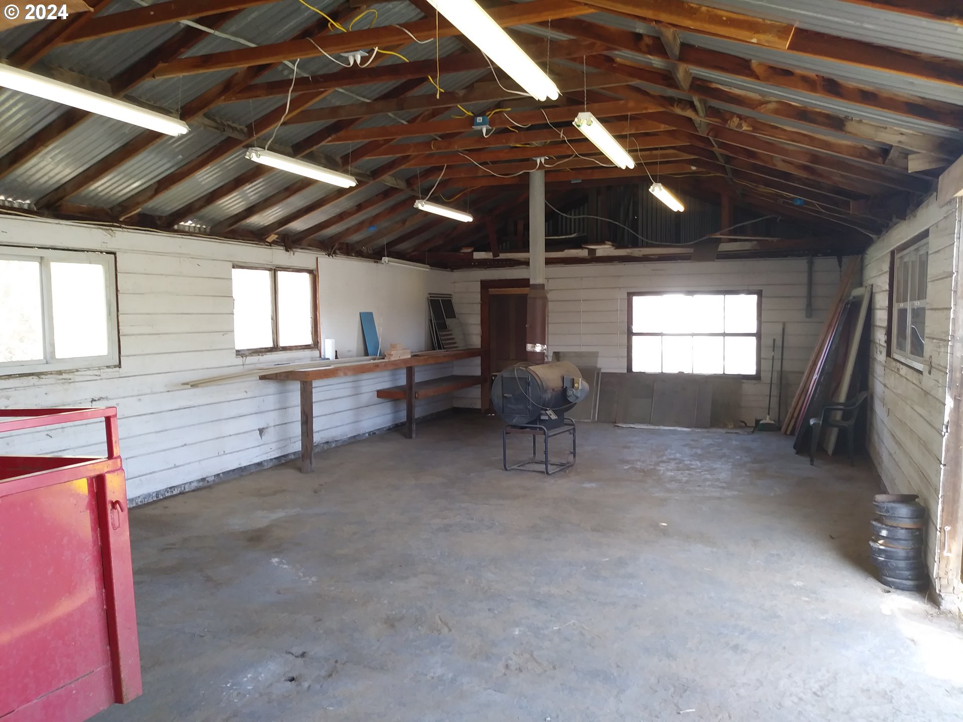 301 2nd Street Moro, OR 97039 - Photo 3 of 8 a view of a livingroom with furniture and a fireplace
