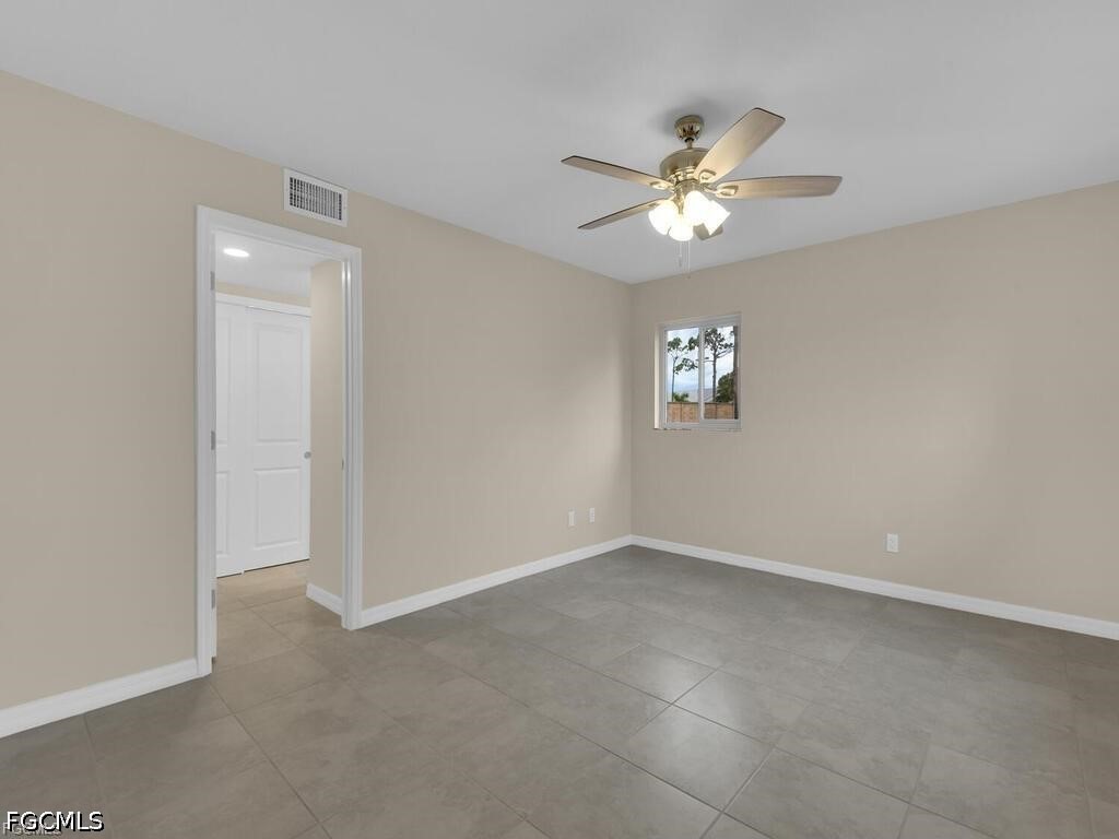 16560 Partridge Place Road, Unit 101 Fort Myers, FL 33908 - Photo 11 of 27 a view of an empty room with a window