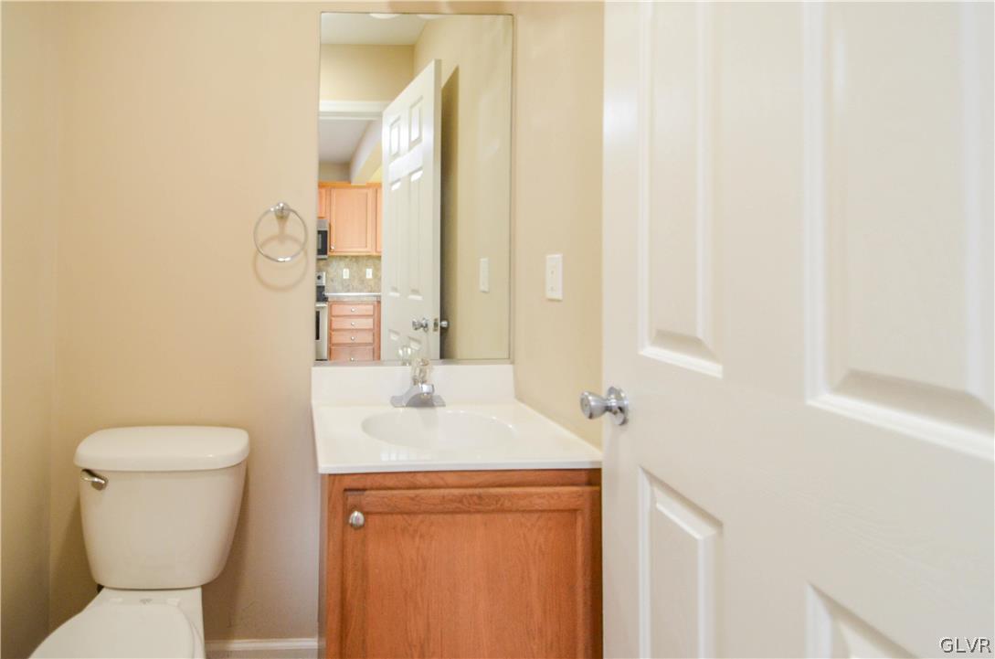 121 Sciota Garden Road Sciota, PA 18354 - Photo 11 of 31 a bathroom with a toilet sink and mirror