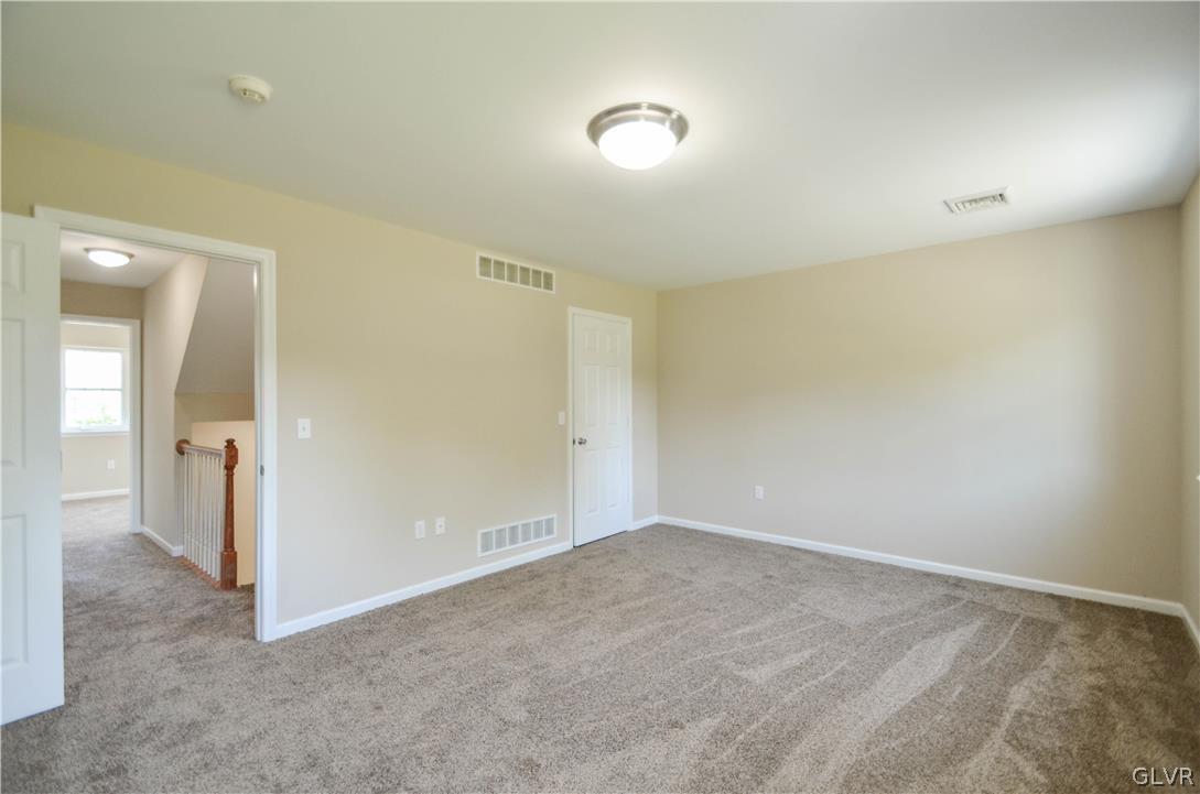 121 Sciota Garden Road Sciota, PA 18354 - Photo 13 of 31 an empty room with a natural light