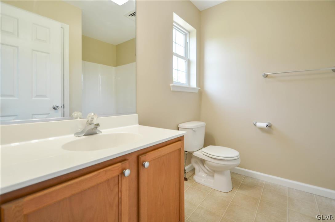 121 Sciota Garden Road Sciota, PA 18354 - Photo 15 of 31 a bathroom with a sink a toilet and a tub