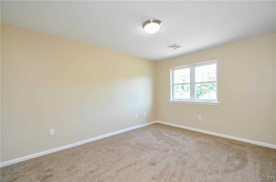 121 Sciota Garden Road Sciota, PA 18354 - Photo 17 of 31 an empty room with a window