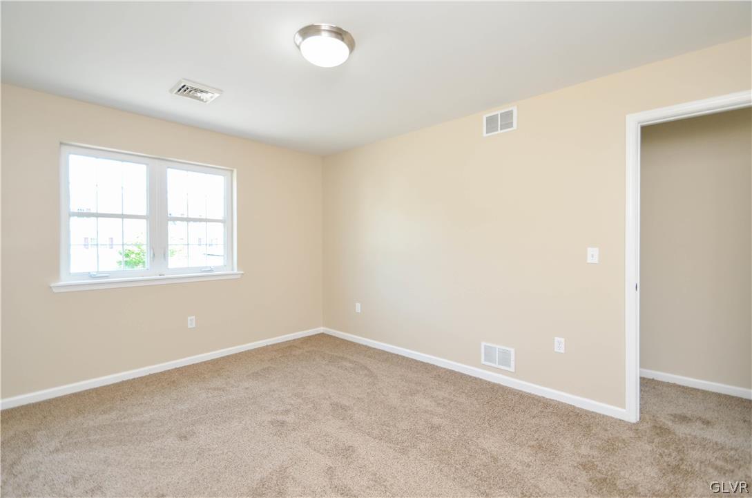 121 Sciota Garden Road Sciota, PA 18354 - Photo 18 of 31 an empty room with a window