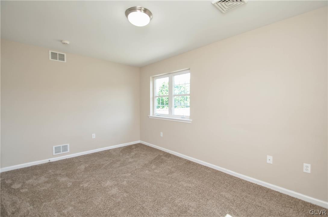 121 Sciota Garden Road Sciota, PA 18354 - Photo 22 of 31 an empty room with windows