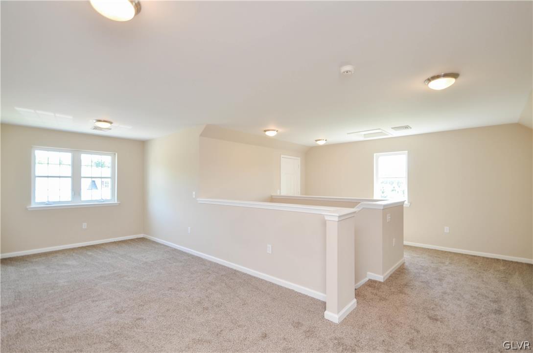 121 Sciota Garden Road Sciota, PA 18354 - Photo 25 of 31 a view of an empty room with windows