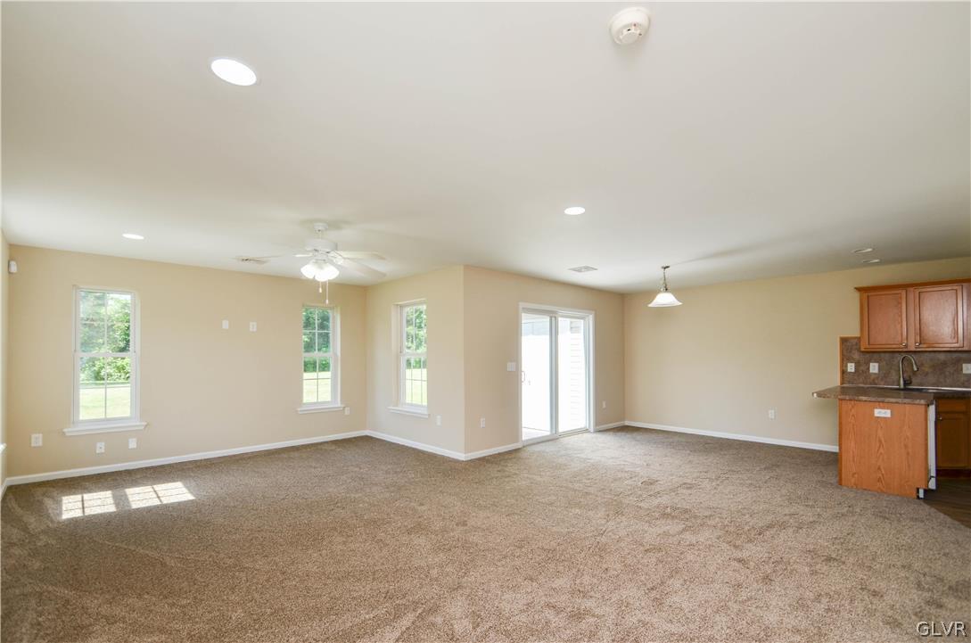 121 Sciota Garden Road Sciota, PA 18354 - Photo 3 of 31 a view of an empty room with a window