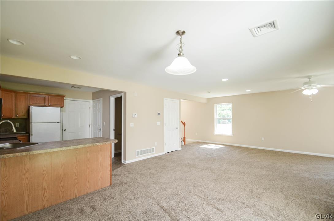 121 Sciota Garden Road Sciota, PA 18354 - Photo 9 of 31 a view of a kitchen with a sink cabinets and a window
