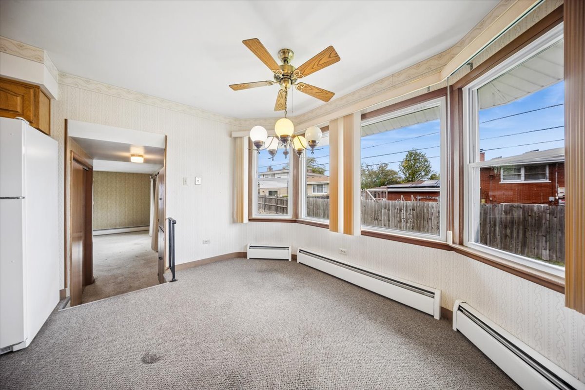 2316 185th Place Lansing, IL 60438 - Photo 10 of 21 a view of an empty room with a window