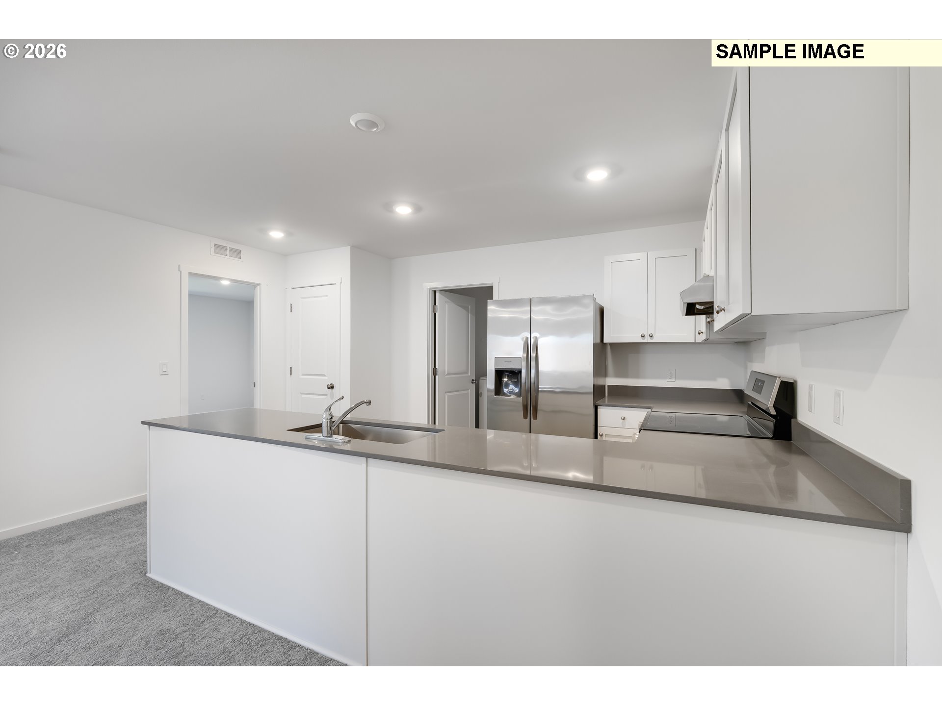 25255 Tanglewood Way Veneta, OR 97487 - Photo 11 of 47 a kitchen with stainless steel appliances granite countertop a sink a stove and a refrigerator