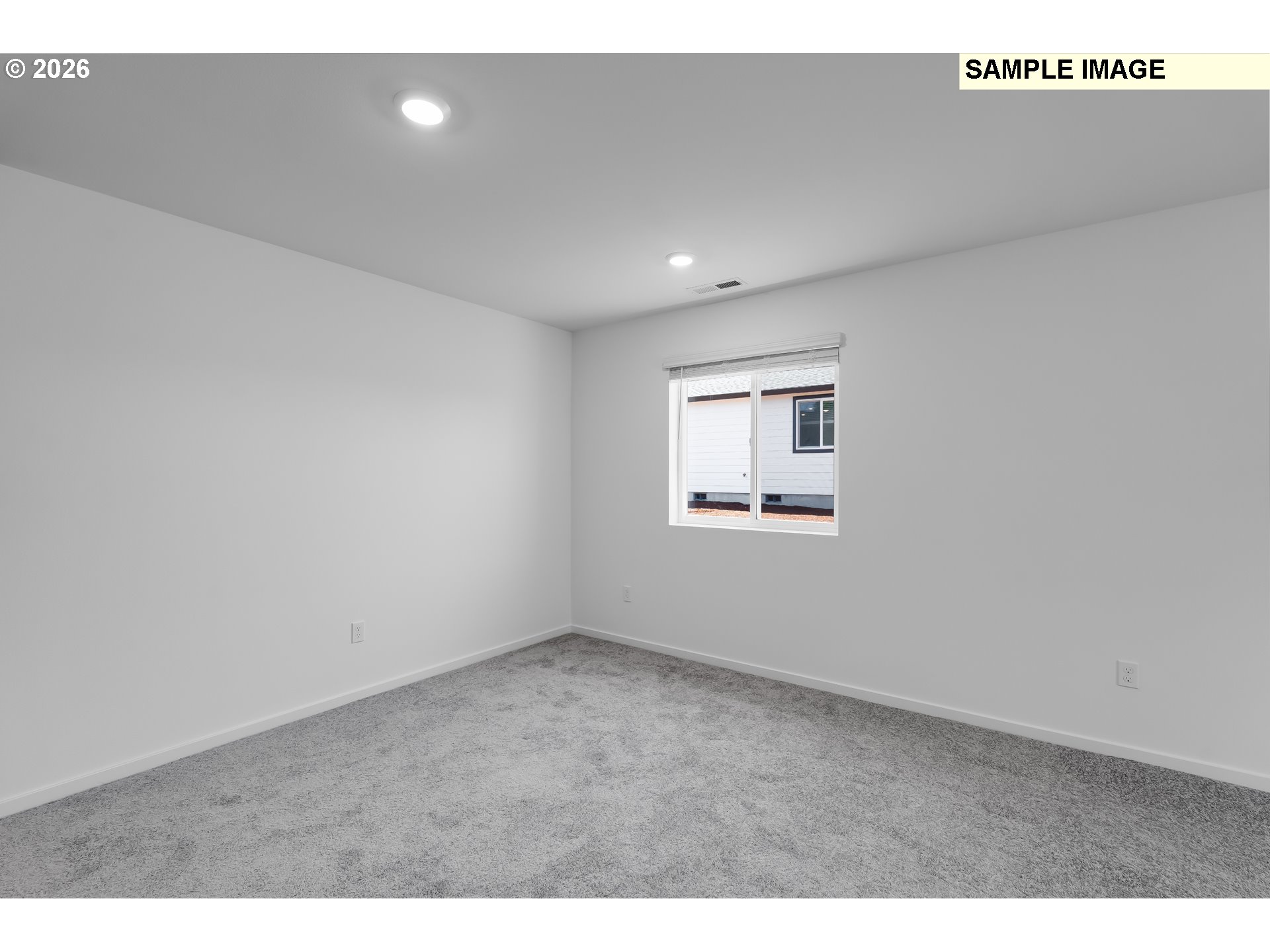25255 Tanglewood Way Veneta, OR 97487 - Photo 14 of 47 a view of an empty room with a window