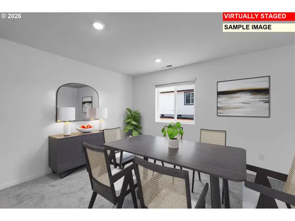 a view of a dining room with furniture