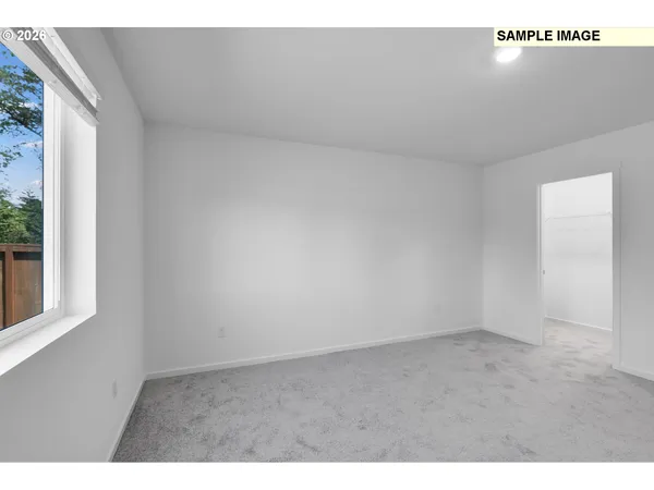 a view of an empty room and window